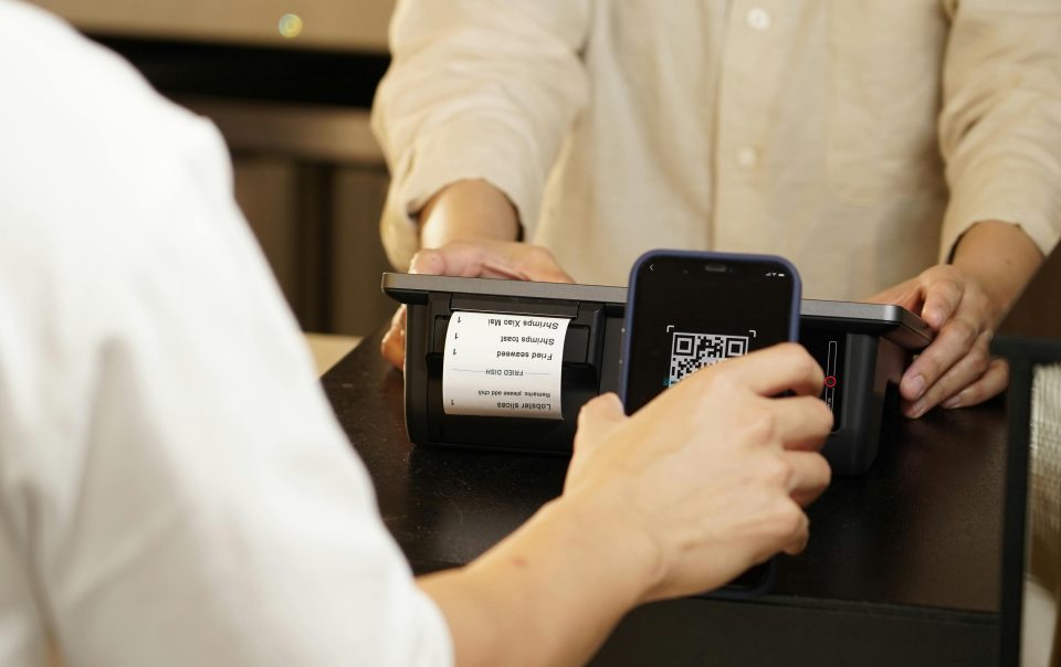 A Close-Up Shot of a Person Scanning a QR Code